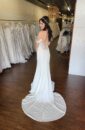 Off the Shoulder Fitted Minimal Wedding Dress with V Neckline and Detailed Lace Illusion Back