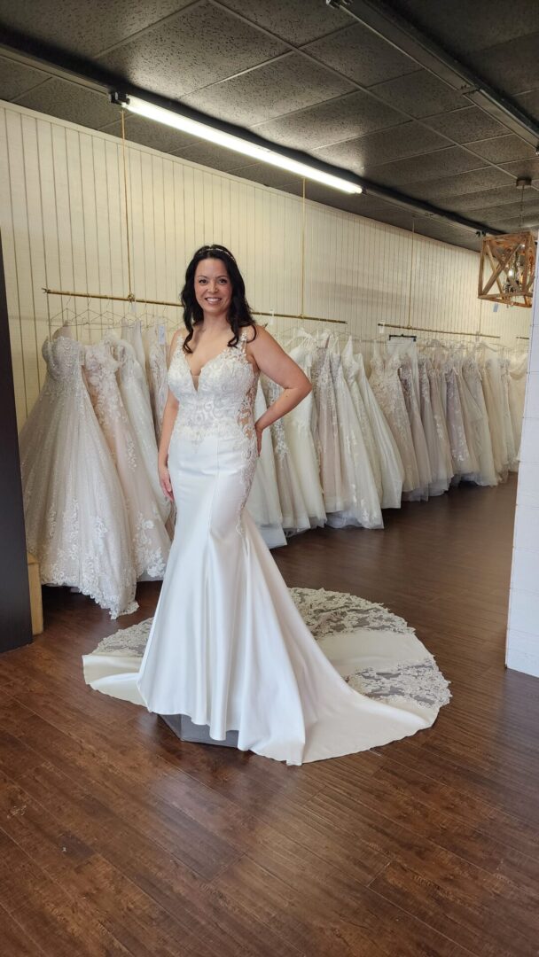 Plus size Mermaid Wedding Dress with lace detailing and dramatic train