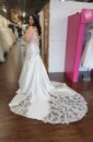 Plus size Mermaid Wedding Dress with lace detailing and dramatic train