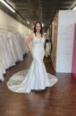 Plus size Mermaid Wedding Dress with lace detailing and dramatic train