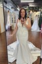 Plus size Mermaid Wedding Dress with lace detailing and dramatic train