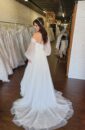 Off the shoulder Clean Flowy Wedding Dress with sleeves and a Slit